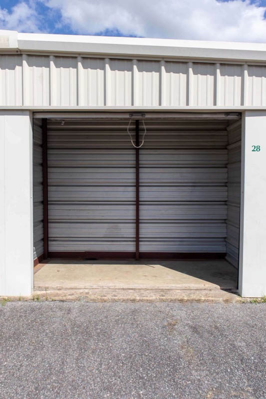 Looking into an open drive-up storage unit at Portsmouth Storage Depot